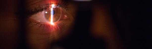 patient taking comprehensive eye exams at Sambursky Eye and Esthetics
